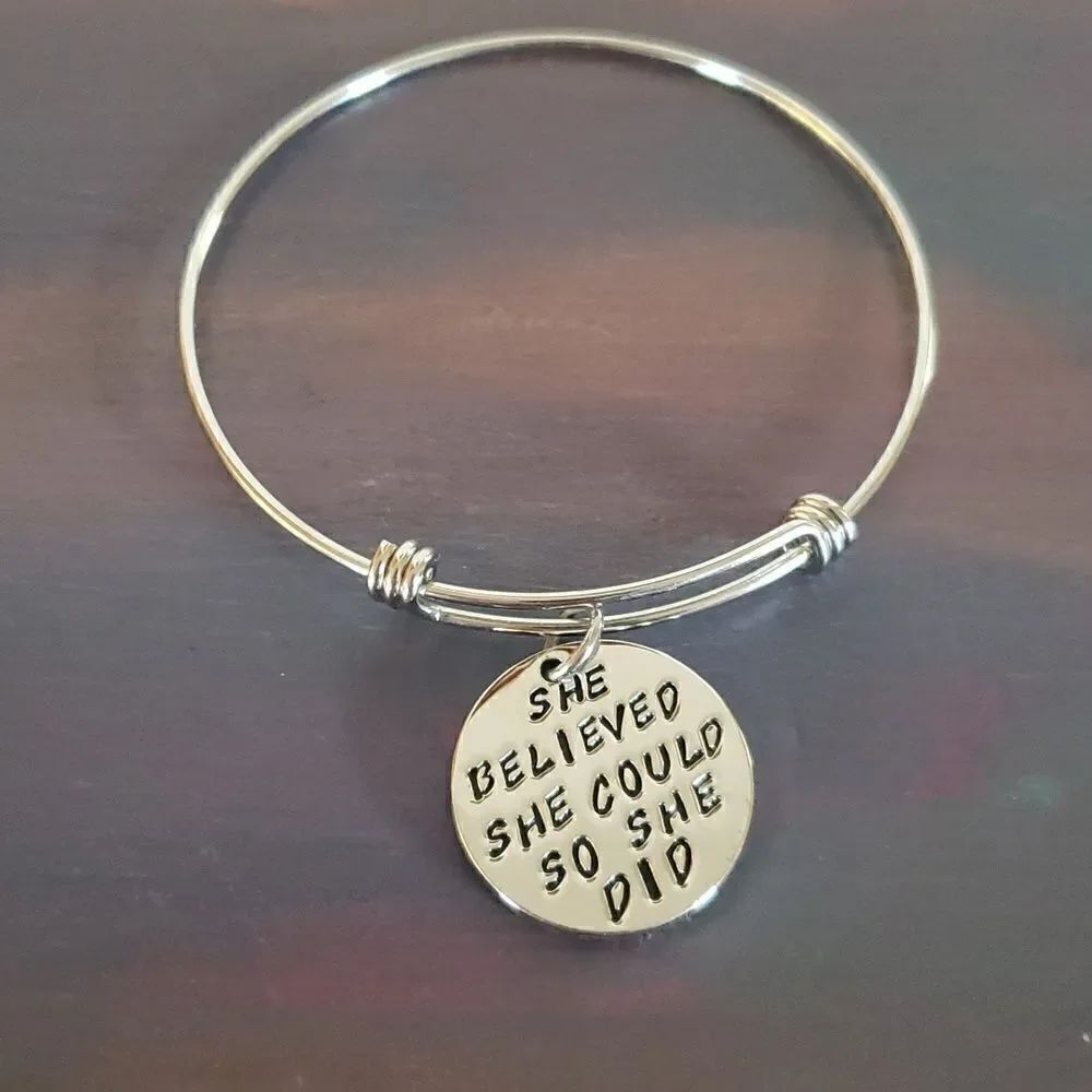 NWOT "She Believed She Could So She Did" Silvertone Wire Charm Bracelet